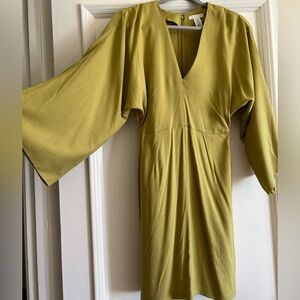 H&M bell sleeve dress in chartreuse green. XS. New without tags. Never worn.